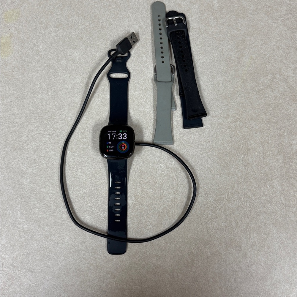 Fitbit Smartwatch with Navy, Gray, and Black Bands